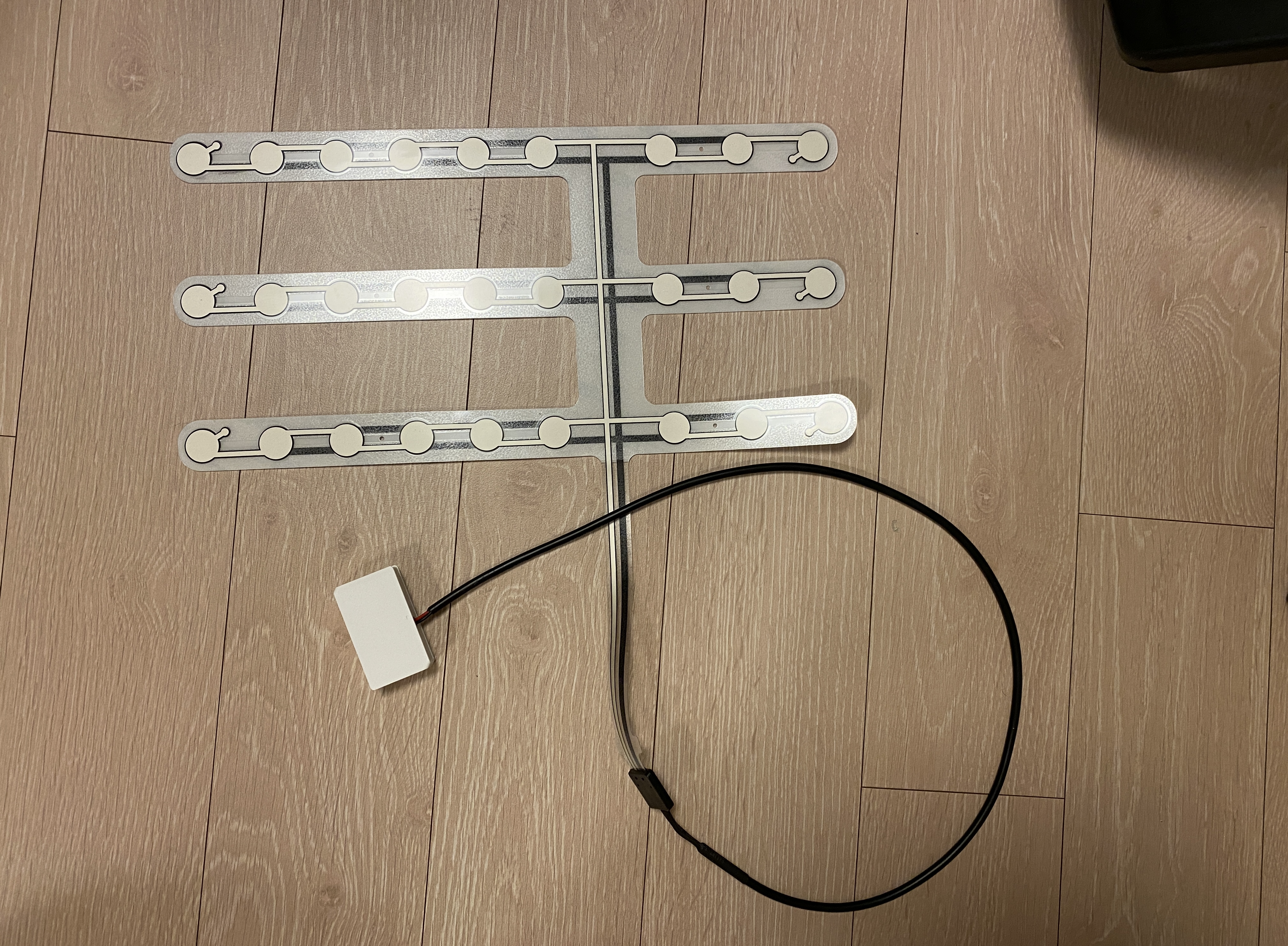 Completed thin-film contact sensor + door sensor assembly